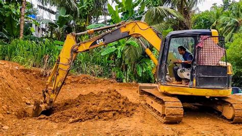 mini digger on its side|mini excavator training for beginner.